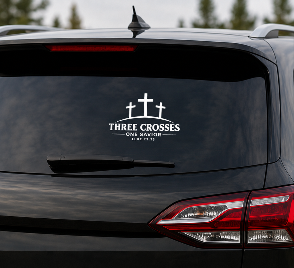 Three Crosses One Savior Christian vinyl decal in white displayed on the rear window of a black SUV.