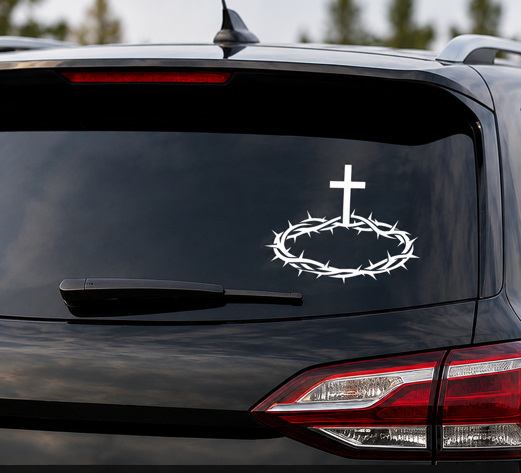 White Crown of Thorns Christian vinyl decal with cross displayed on the rear window of a black SUV.