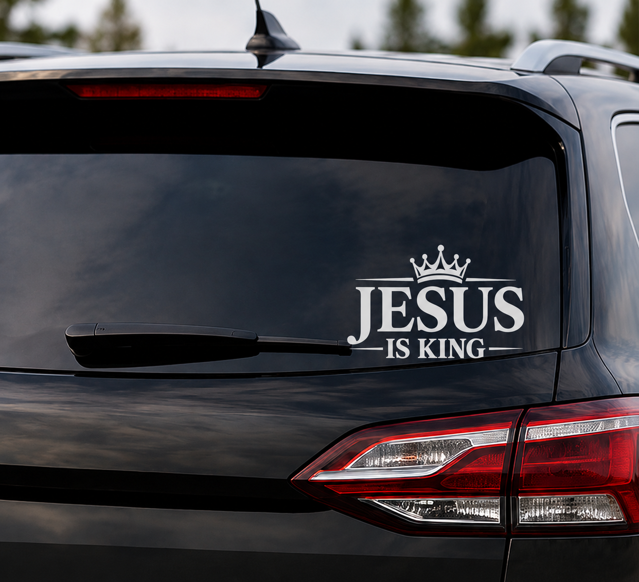 Jesus Is King Christian vinyl decal displayed on a vehicle rear window