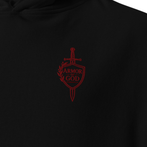 Close-up of black Armor of God Ephesians 6:11 premium embroidered Christian hoodie with red shield and sword chest embroidery.