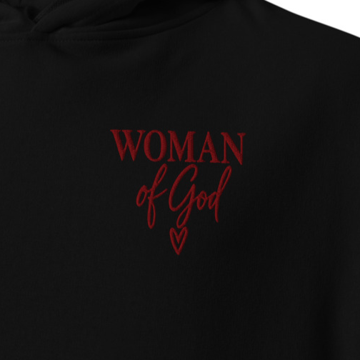 Close-up of black Woman of God premium embroidered Christian hoodie with red script chest embroidery and heart detail.