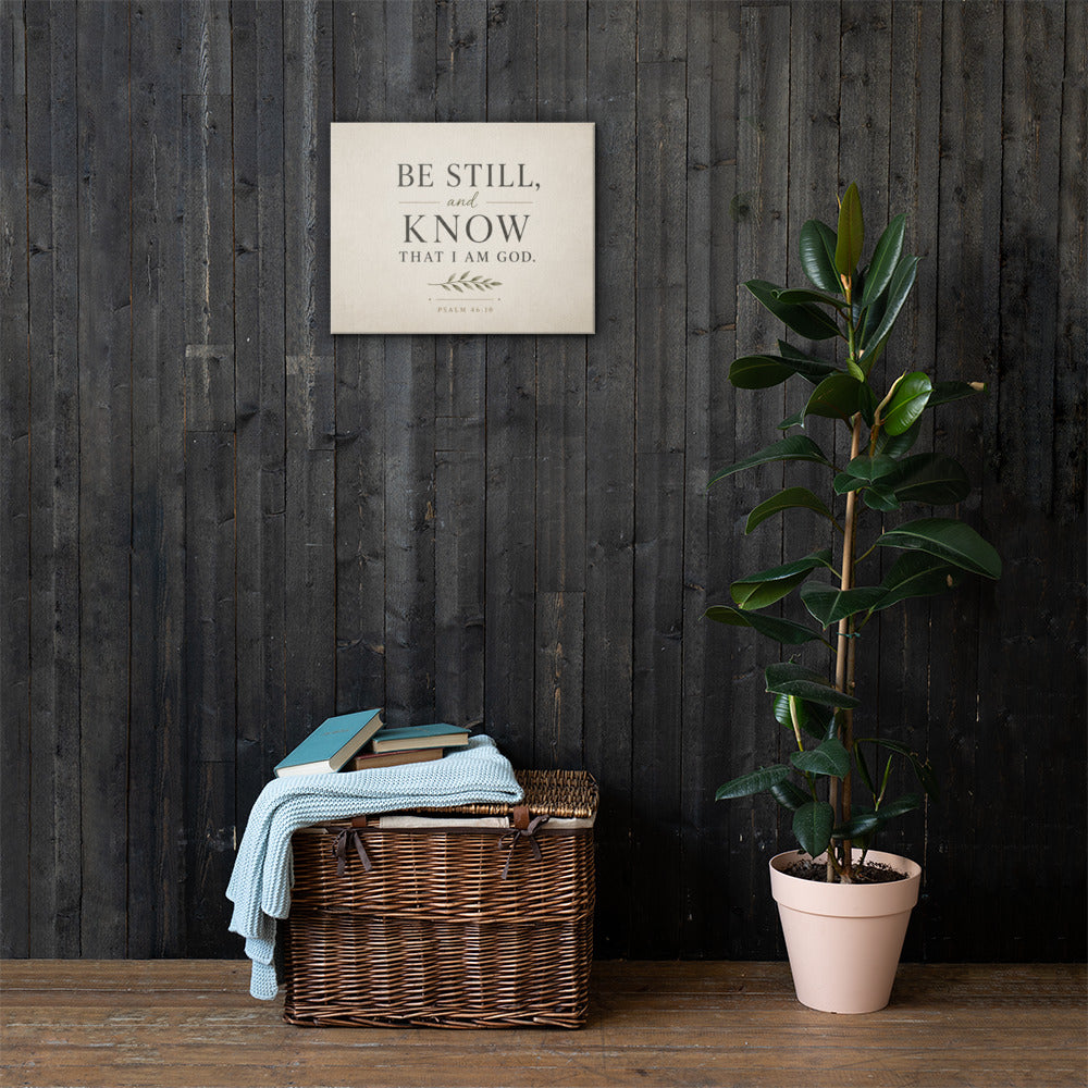 Be Still and Know Psalm 46:10 Christian canvas wall art displayed on dark wood wall