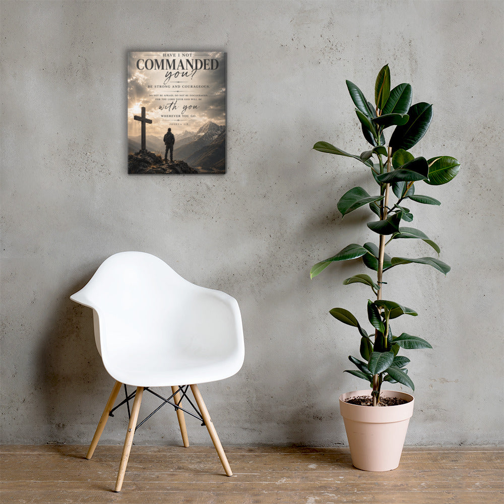 Joshua 1:9 Scripture canvas wall art with cross and mountain artwork in modern home interior