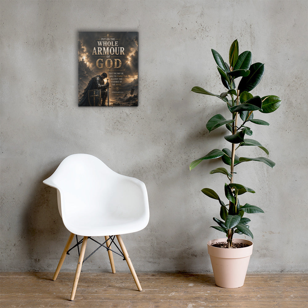 Put On the Whole Armour of God canvas displayed large beside white chair and green plant