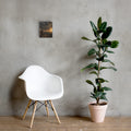 Watchman on the Wall Bible art displayed in a bright modern room with chair and plant