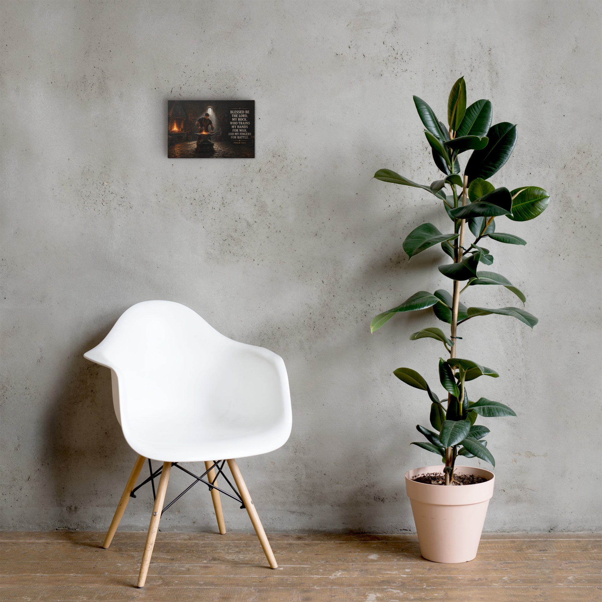 He Trains My Hands for War Christian canvas displayed beside white chair and green plant
