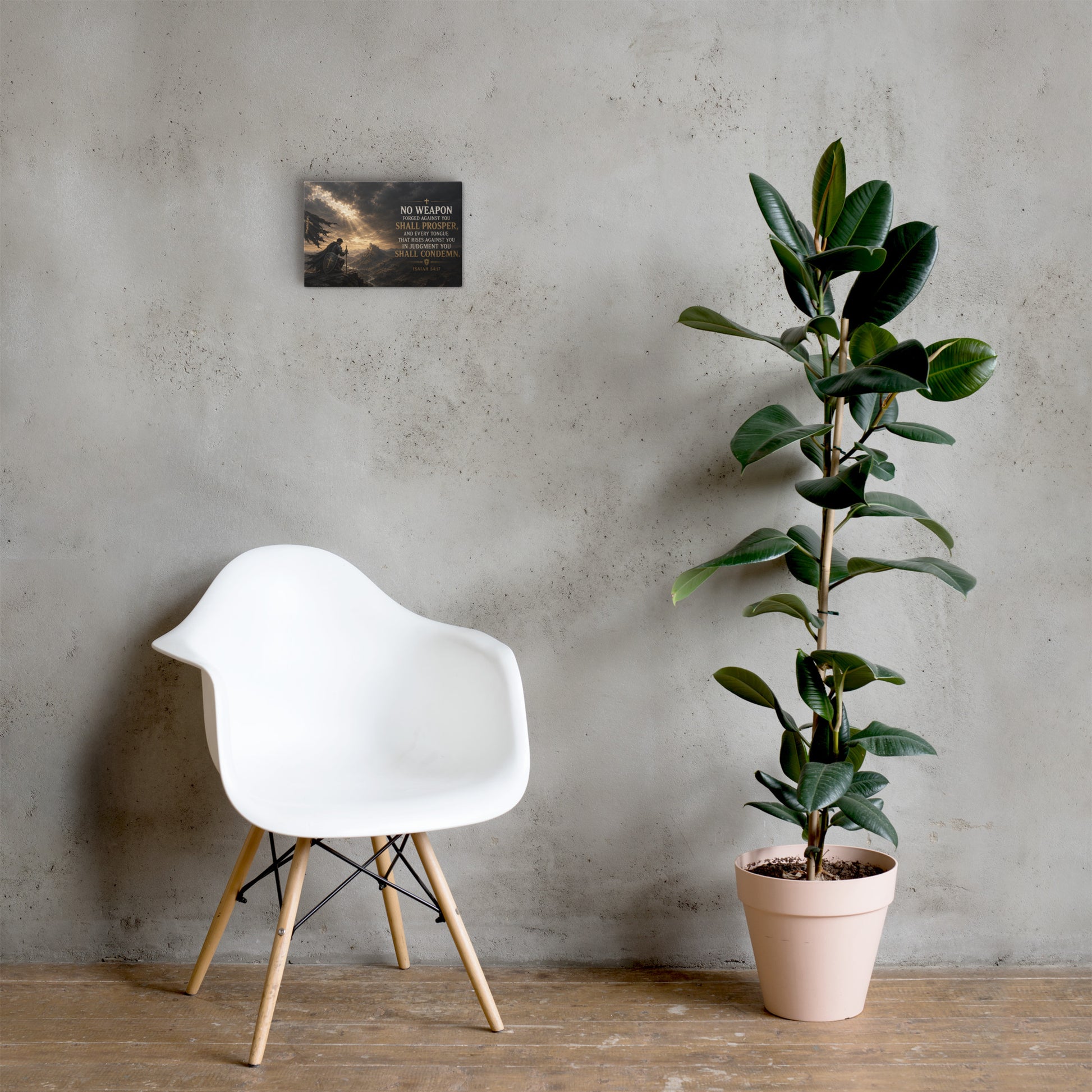 Isaiah 54:17 Christian warrior canvas displayed beside white chair and green plant