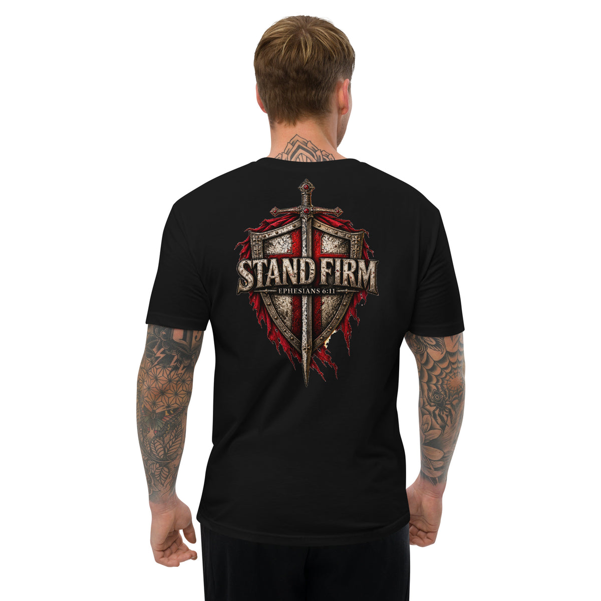 Man wearing black Stand Firm shirt showing large Ephesians 6:11 shield and sword artwork