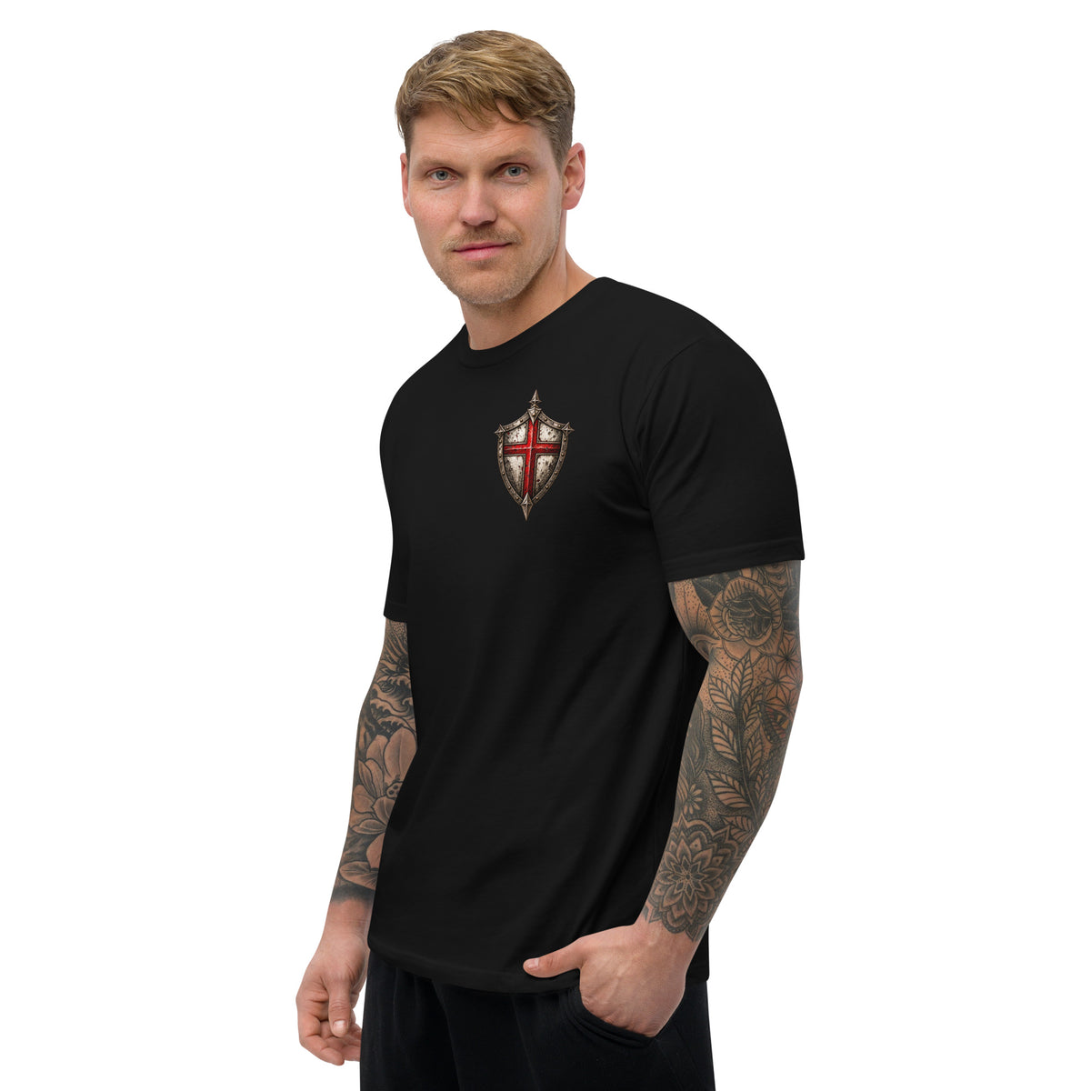 Three-quarter view of black Stand Firm Christian T-shirt with red cross chest shield
