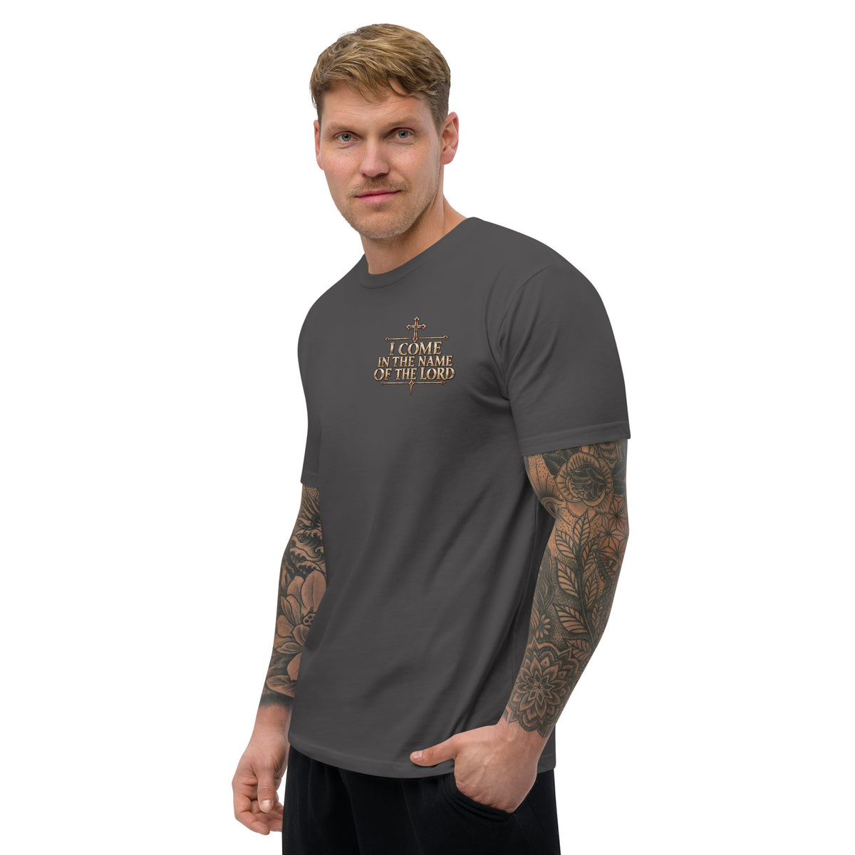 Angled model view of Heavy Metal Grey men's faith shirt with medieval Christian chest emblem