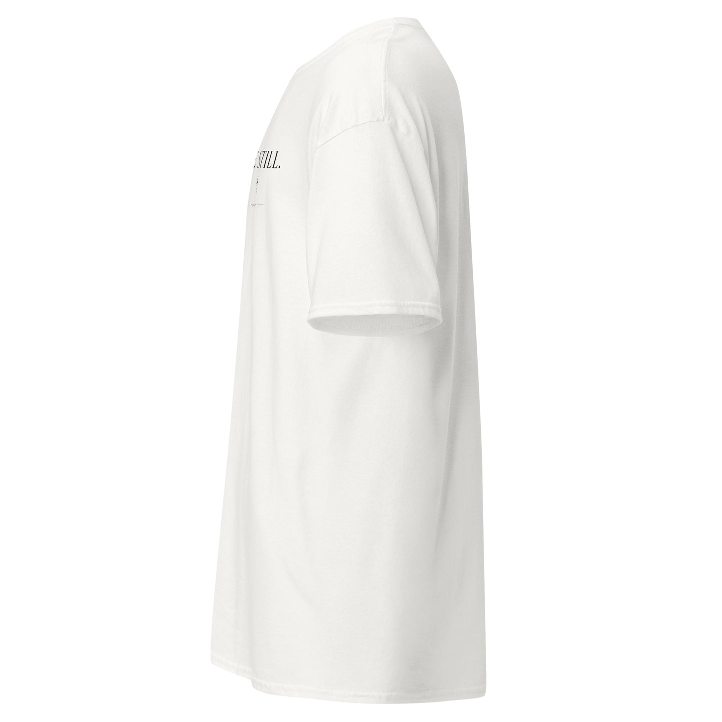 Be Still Christian scripture shirt shown from the side with minimalist front design
