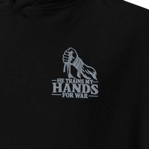 Black He Trains My Hands for War Christian hoodie with grey Psalm 144:1 sword and mountain embroidery