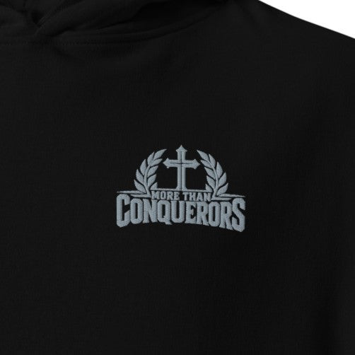 Black More Than Conquerors Christian hoodie with grey Romans 8:37 cross and laurel embroidery