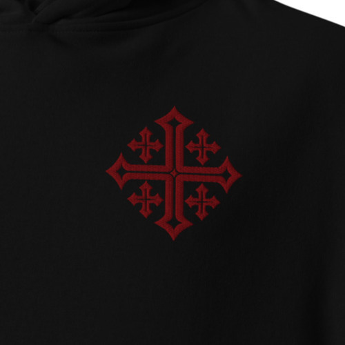 Close-up of maroon Jerusalem Cross embroidery on black women’s Christian hoodie
